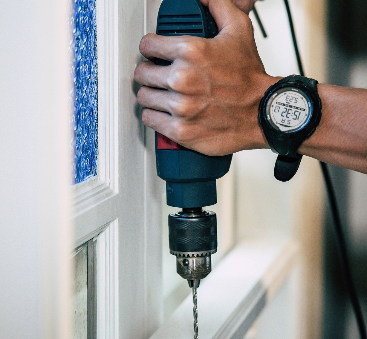 Woman sitting next to a boombox